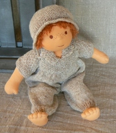 klik voor meer info Kleding-set voor een 30 cm pop.